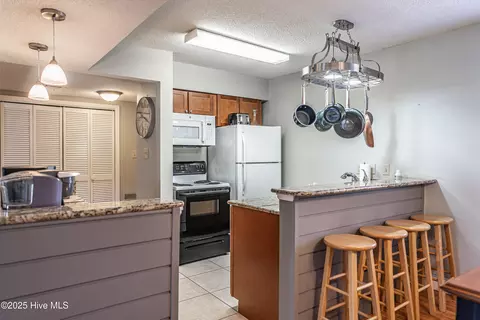 Kitchen - 85 Pine Valley Rd # 42, Pinehurst, NC 28374 photo 6 of 6