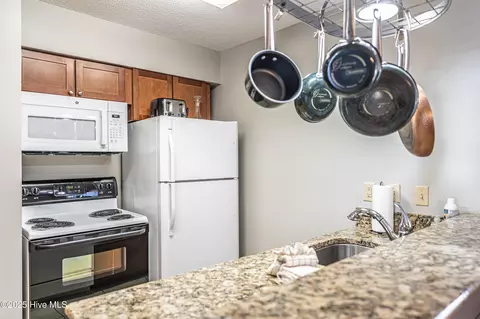 Kitchen - 85 Pine Valley Rd # 42, Pinehurst, NC 28374 photo 4 of 6