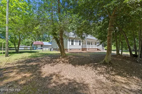 Exterior - 981 Sloop Point Loop Rd, Hampstead, NC 28443 photo 2 of 17