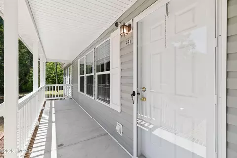 Exterior - 981 Sloop Point Loop Rd, Hampstead, NC 28443 photo 5 of 17