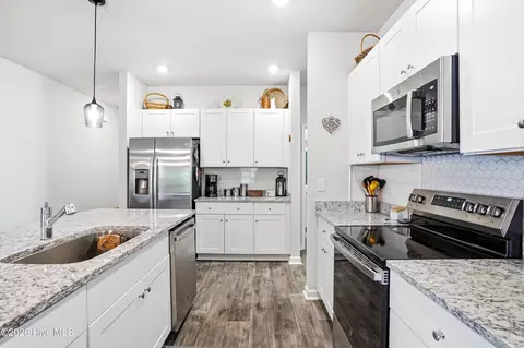 Kitchen - 502 Ladyfish Loop NW, Sunset Beach, NC 28468 photo 2 of 4