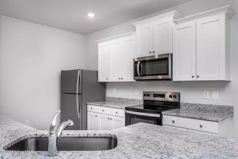 Kitchen - 11640 International Dr, Middlesex, NC 27557 photo 2 of 5