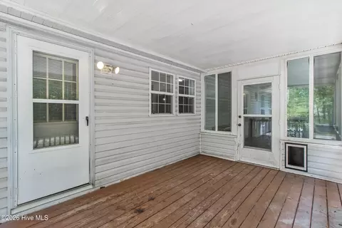 Exterior - 180 Quails Cv, Hampstead, NC 28443 photo 9 of 14