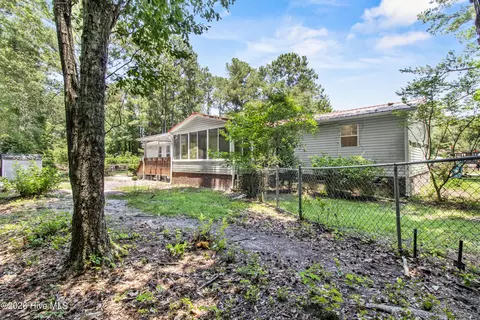 Exterior - 180 Quails Cv, Hampstead, NC 28443 photo 10 of 14