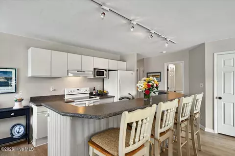 Kitchen - 816 Colony Pl SW # D, Sunset Beach, NC 28468 photo 2 of 4