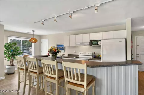 Kitchen - 816 Colony Pl SW # D, Sunset Beach, NC 28468 photo 1 of 4