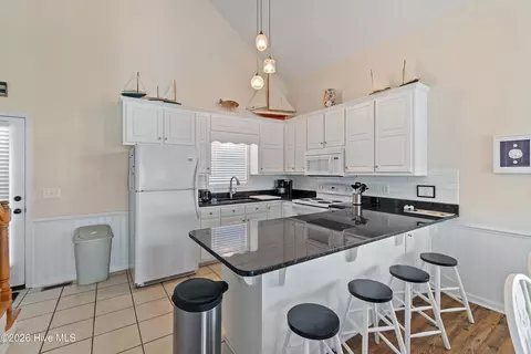 Kitchen - 423 Cobia St, Sunset Beach, NC 28468 photo 2 of 3