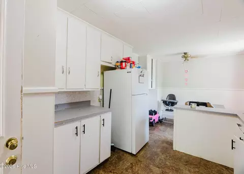 Kitchen - 303 Myrtle Ave, Hamlet, NC 28345 photo 1 of 5