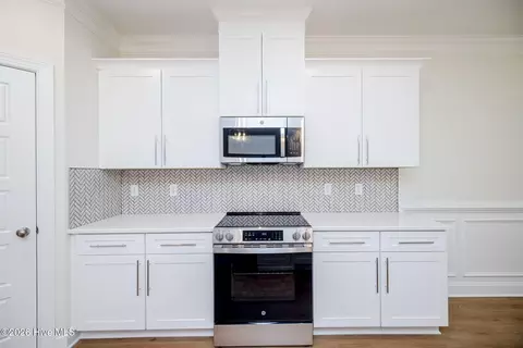 Kitchen - 1077 W Berkley Ct, Thomson, GA 30824 photo 2 of 6