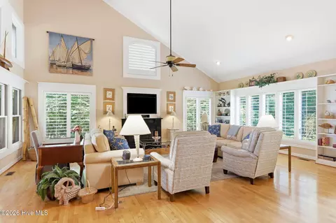 Living - 142 Oakleaf Dr, Pine Knoll Shores, NC 28512 photo 2 of 4