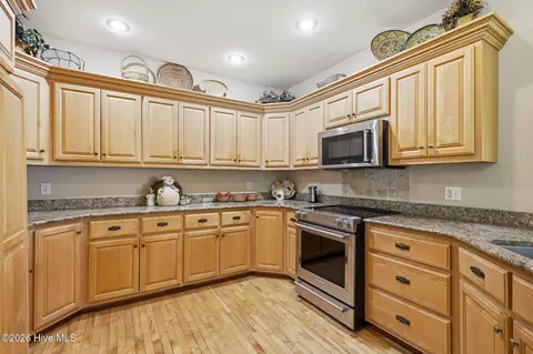 Kitchen - 142 Oakleaf Dr, Pine Knoll Shores, NC 28512 photo 3 of 5