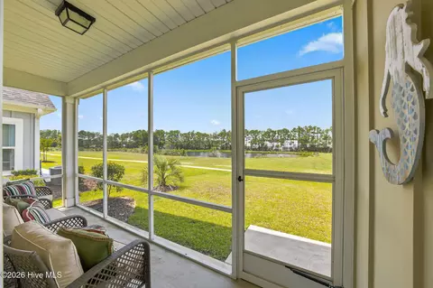 Exterior - 7605 Privateer Loop, Sunset Beach, NC 28468 photo 4 of 13