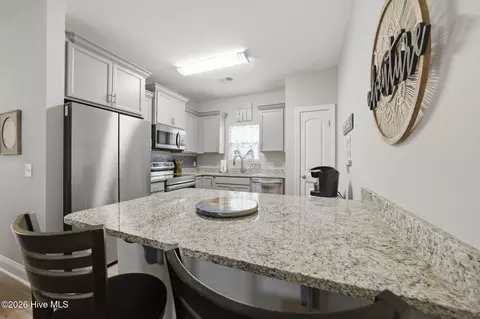 Kitchen - 7605 Privateer Loop, Sunset Beach, NC 28468 photo 2 of 7