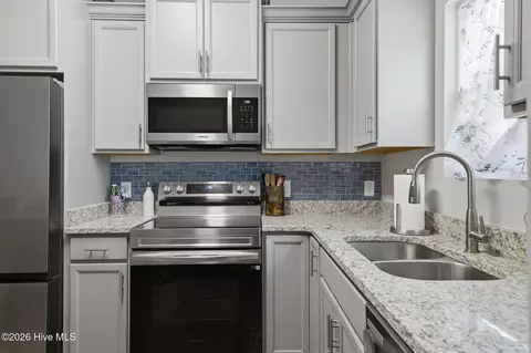 Kitchen - 7605 Privateer Loop, Sunset Beach, NC 28468 photo 3 of 7