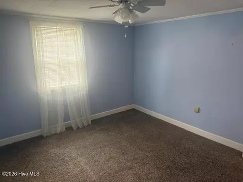 Bedroom - 507 E 3rd Ave, Chadbourn, NC 28431 photo 2 of 12