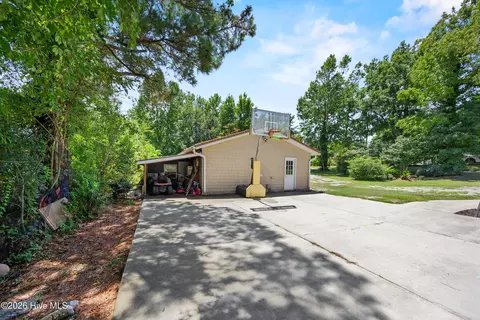Exterior - 667 Hughes Rd, Hampstead, NC 28443 photo 8 of 19
