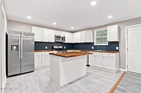 Kitchen - 211 E Williamson St, Mount Olive, NC 28365 photo 3 of 4