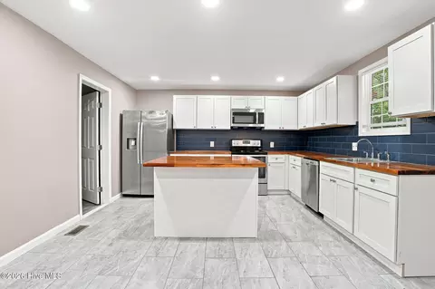 Kitchen - 211 E Williamson St, Mount Olive, NC 28365 photo 4 of 4