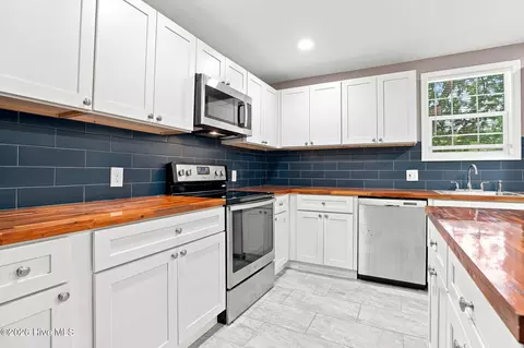 Kitchen - 211 E Williamson St, Mount Olive, NC 28365 photo 2 of 4