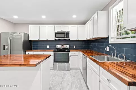 Kitchen - 211 E Williamson St, Mount Olive, NC 28365 photo 1 of 4