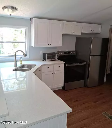 Kitchen - 2146 Forest Dr SW, Supply, NC 28462 photo 2 of 2