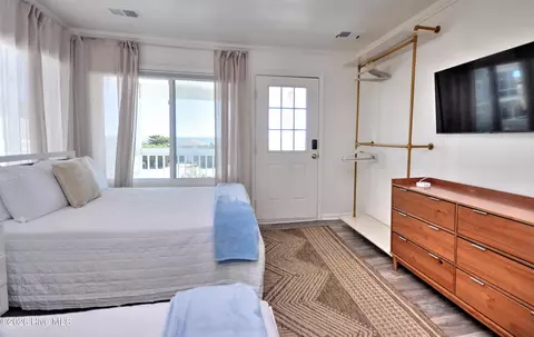 Bedroom - 100 E Second St, Ocean Isle Beach, NC 28469 photo 7 of 7