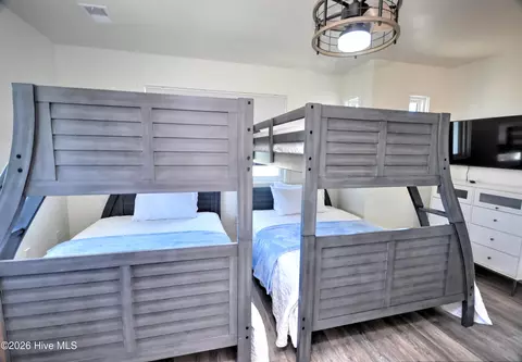 Bedroom - 100 E Second St, Ocean Isle Beach, NC 28469 photo 5 of 7