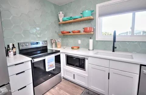 Kitchen - 100 E Second St, Ocean Isle Beach, NC 28469 photo 3 of 4