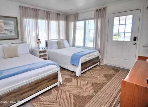 Bedroom - 100 E Second St, Ocean Isle Beach, NC 28469 photo 6 of 7
