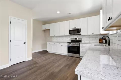 Kitchen - 125 Wilson St, Erwin, NC 28339 photo 2 of 4