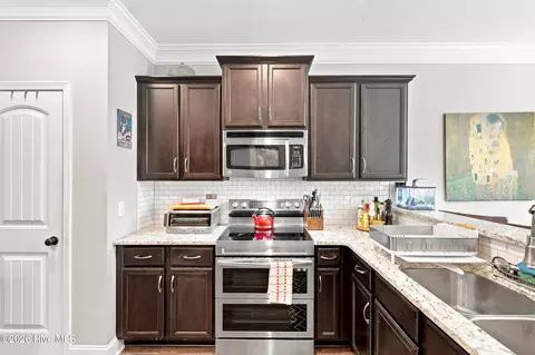 Kitchen - 111 Mason Ct, Hampstead, NC 28443 photo 2 of 5