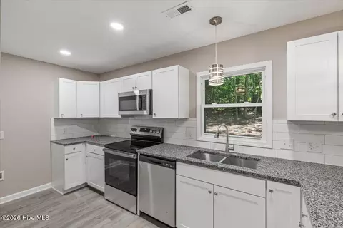 Kitchen - 115 Wood River Rd, West End, NC 27376 photo 3 of 3