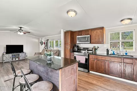 Kitchen - 135 Meadow Ln, Hamlet, NC 28345 photo 2 of 3