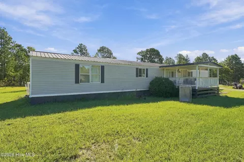 Exterior - 135 Meadow Ln, Hamlet, NC 28345 photo 3 of 10