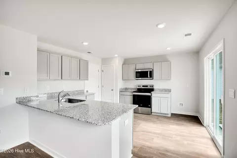 Kitchen - 1273 Skystone Loop NE #LOT 19, Supply, NC 28462 photo 1 of 5