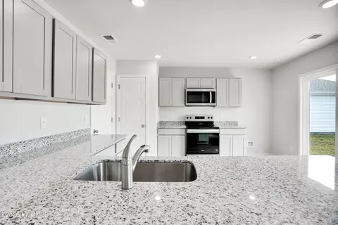 Kitchen - 1273 Skystone Loop NE #LOT 19, Supply, NC 28462 photo 2 of 5