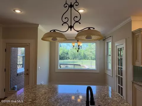 Kitchen - 39 E Calhoun St, Wadley, GA 30477 photo 2 of 3