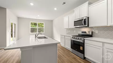 Kitchen - 399 Abbott Rd, Statham, GA 30666 photo 3 of 3