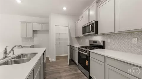 Kitchen - 422 Abbott Rd, Statham, GA 30666 photo 4 of 4