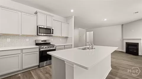 Kitchen - 422 Abbott Rd, Statham, GA 30666 photo 3 of 4