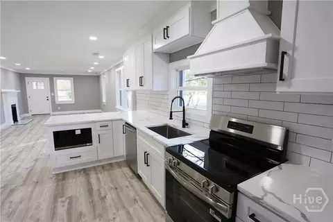 Kitchen - 1006 E Church St, Monroe, GA 30655 photo 2 of 3