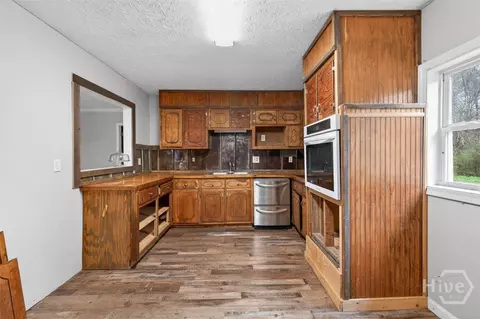 Kitchen - 2669 H D Atha Rd, Monroe, GA 30655 photo 1 of 2
