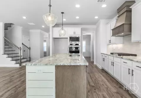 Kitchen - 596 Calgary Downs Dr, Winder, GA 30680 photo 3 of 4