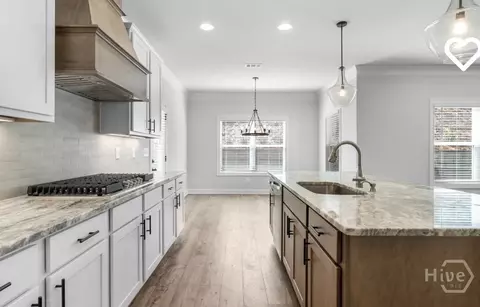 Kitchen - 596 Calgary Downs Dr, Winder, GA 30680 photo 2 of 4
