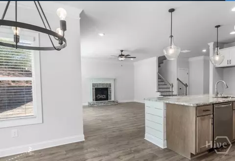 Living - 596 Calgary Downs Dr, Winder, GA 30680 photo 2 of 3