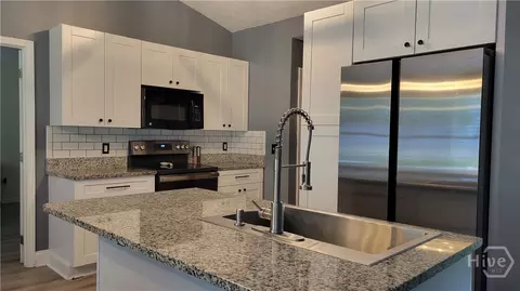Kitchen - 2140 Summerset Dr, Monroe, GA 30656 photo 2 of 4