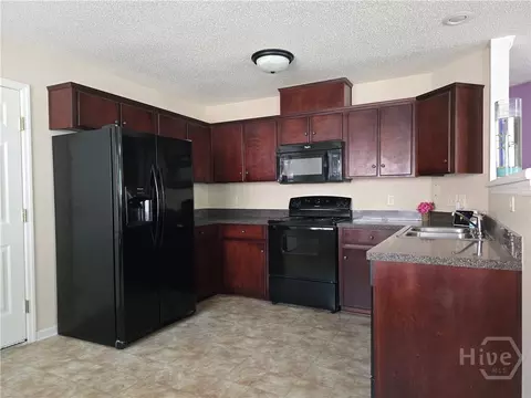 Kitchen - 182 Gloucester Dr, Midway, GA 31320 photo 2 of 2