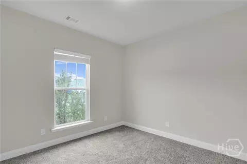Bedroom - 125 Thoroughbred Dr, Guyton, GA 31312 photo 4 of 7