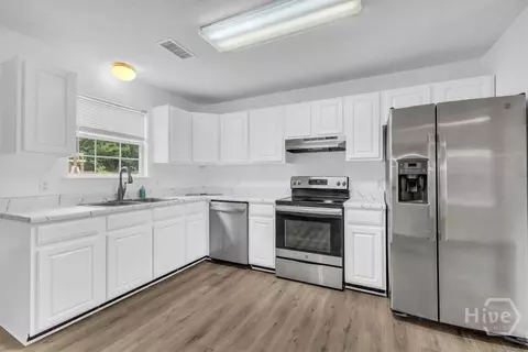 Kitchen - 304 E Tietgen St, Pooler, GA 31322 photo 1 of 2