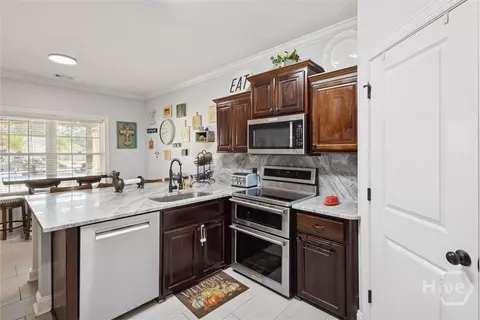 Kitchen - 119 Stadium Dr, Guyton, GA 31312 photo 2 of 5